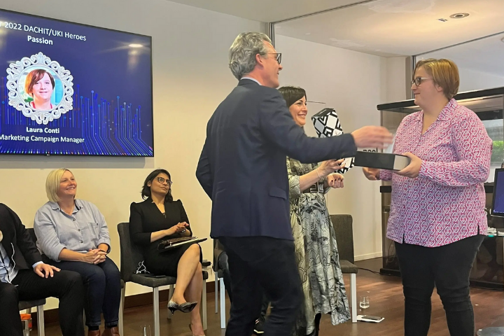 Laura Receiving an award at work